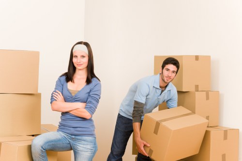 House moving team handling furniture in Beddington