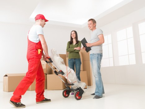 Local moving team handling a van in Beddington street