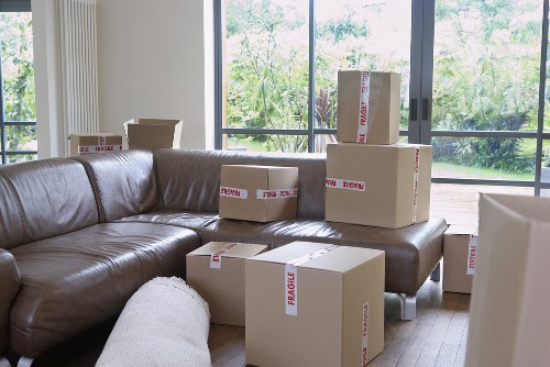 Furniture and boxes being carefully moved from a Beddington property