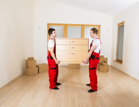 Loading furniture and boxes into a van for a Beddington removal